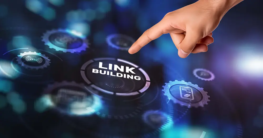 Hand pointing at a Link Building icon, symbolizing backlink analysis and strategies for backlink building services.